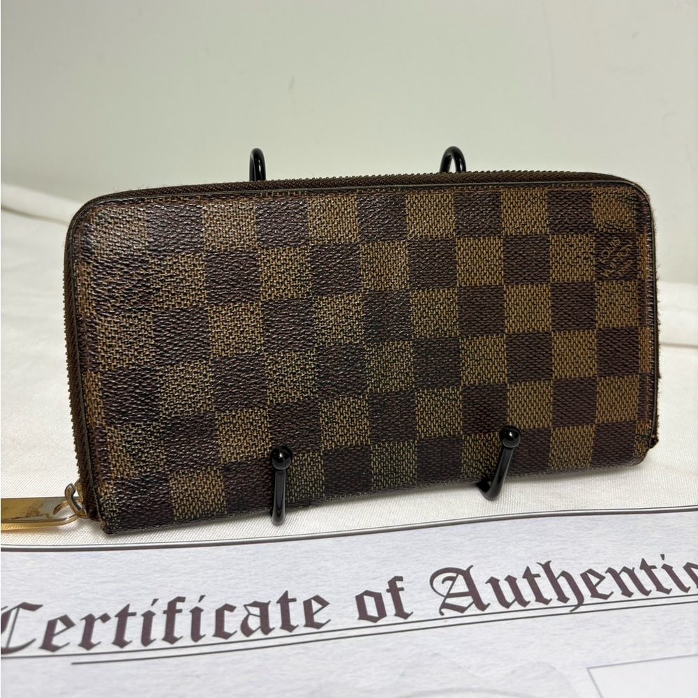 Authentic LOUIS VUITTON Damier ebene, long zippy wallet as is with certificate
